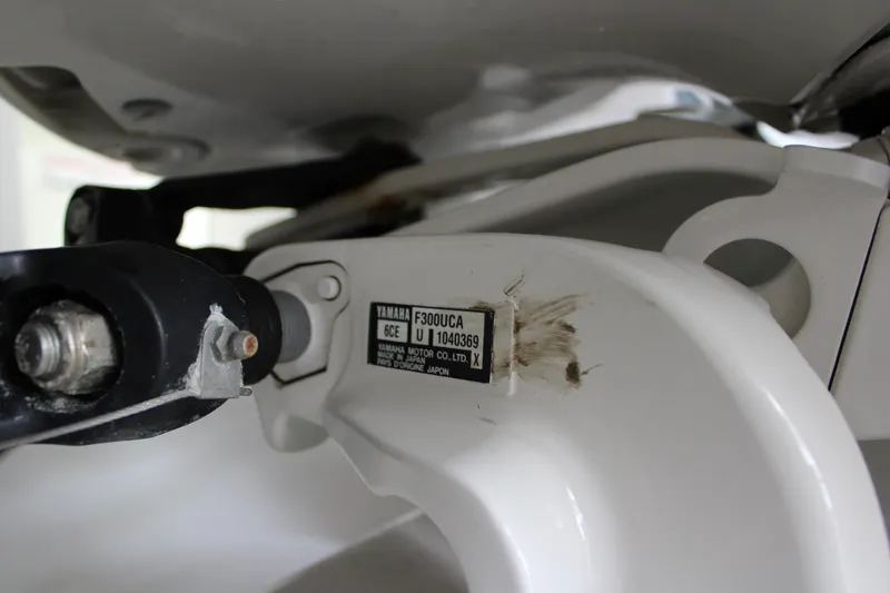Slide: The Image of Close-up of a Yamaha F300UCA engine part on a 2018 Jupiter 30 HFS boat. - 12