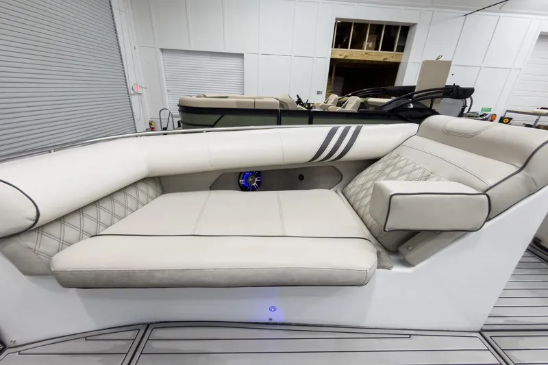 Slide: The Image of 2020 Crest Continental 270 NX-L Twin boat interior with luxurious seating and modern design. - 12
