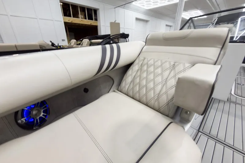 Slide: The Image of Luxurious interior of 2020 Crest Continental 270 NX-L Twin boat with plush seating. - 13