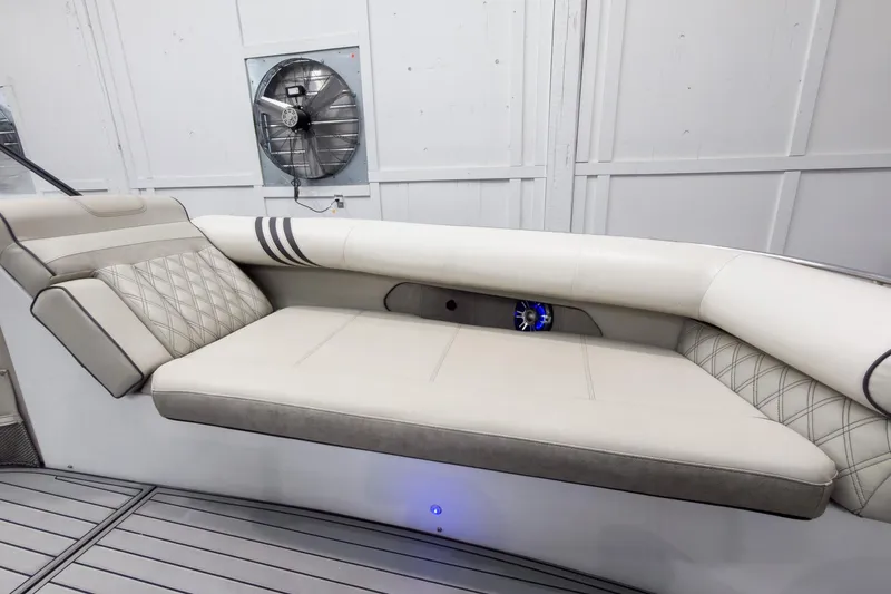 Slide: The Image of Luxurious seating on 2020 Crest Continental 270 NX-L Twin boat, featuring elegant upholstery and modern design. - 14
