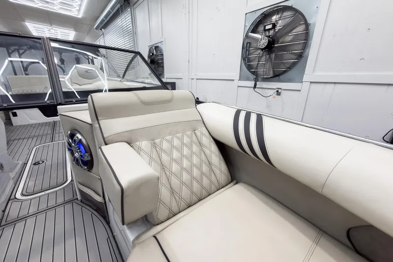 Slide: The Image of Luxurious interior of 2020 Crest Continental 270 NX-L Twin boat with plush seating. - 15