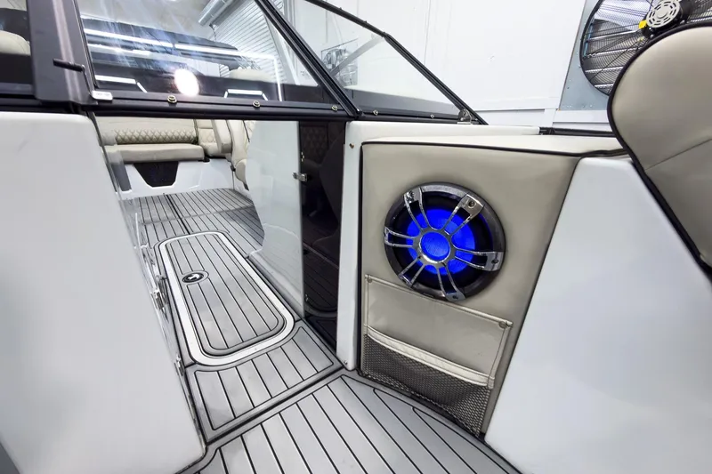 Slide: The Image of 2020 Crest Continental 270 NX-L Twin interior with sleek flooring and illuminated speaker. - 18