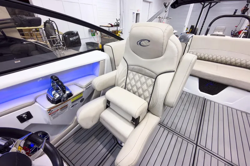 Slide: The Image of Luxury interior of 2020 Crest Continental 270 NX-L Twin boat with plush seating. - 23