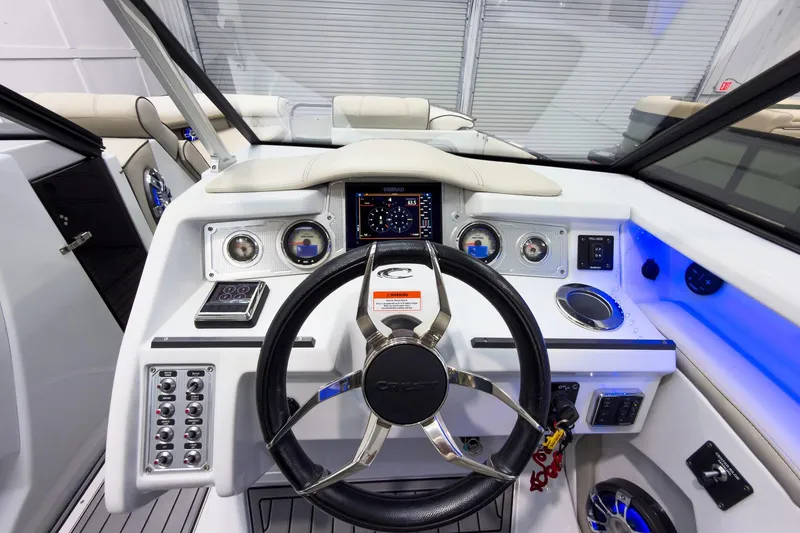 Slide: The Image of Cockpit of 2020 Crest Continental 270 NX-L Twin with modern controls and illuminated dashboard. - 24
