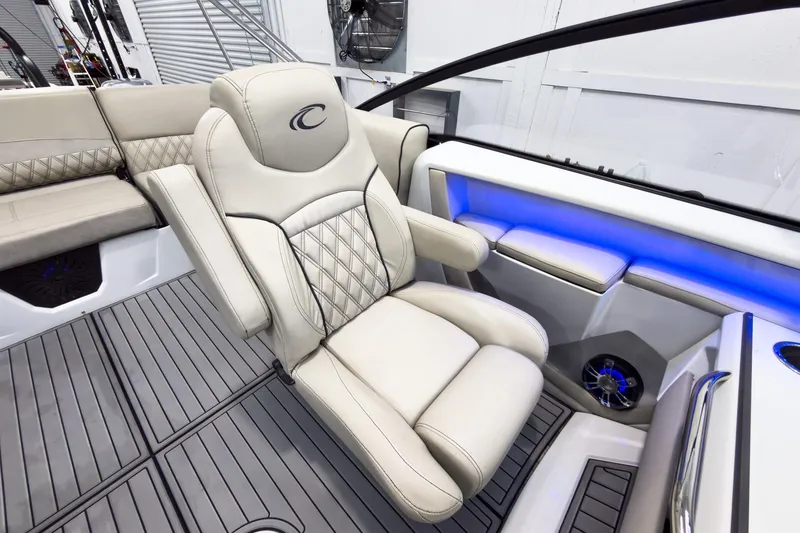 Slide: The Image of Luxurious interior of 2020 Crest Continental 270 NX-L Twin boat with plush seating and ambient lighting. - 29