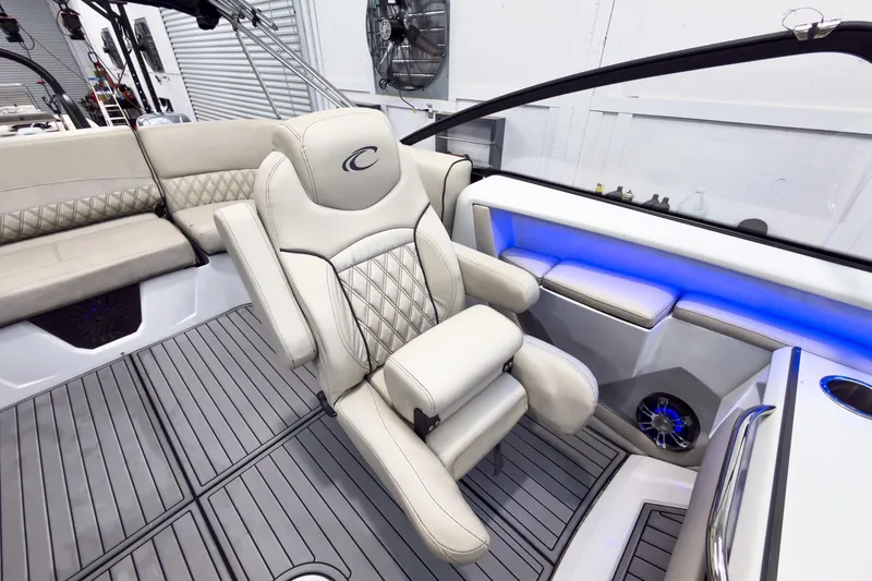 Slide: The Image of Luxurious interior of 2020 Crest Continental 270 NX-L Twin boat with plush seating and ambient lighting. - 30