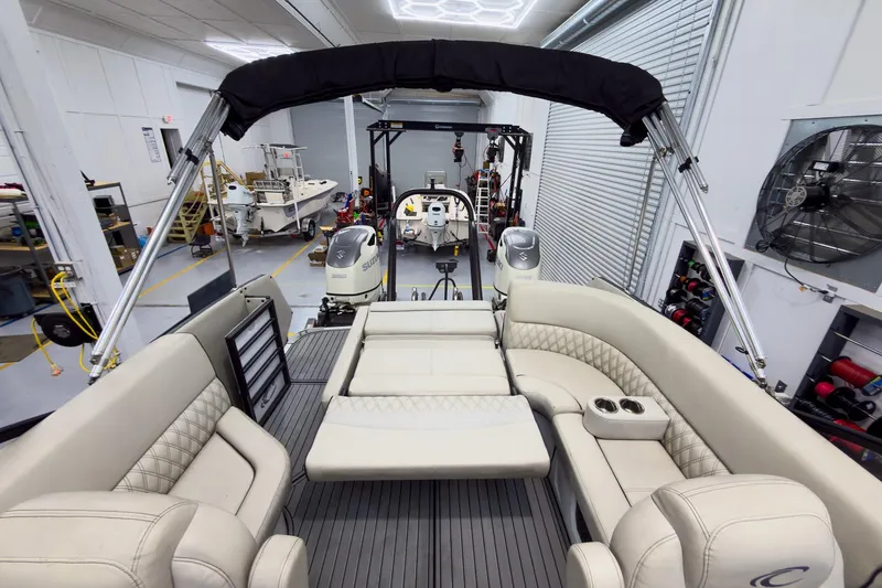 Slide: The Image of 2020 Crest Continental 270 NX-L Twin pontoon boat interior in a workshop setting. - 36