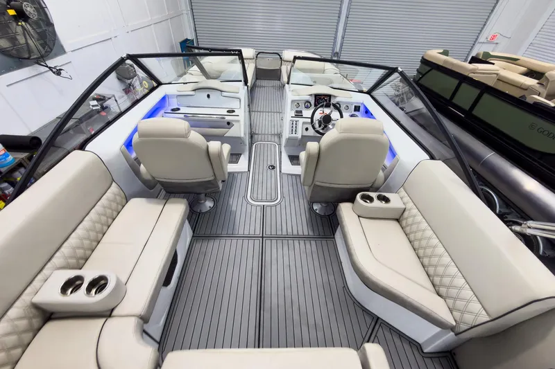 Slide: The Image of Luxurious interior of 2020 Crest Continental 270 NX-L Twin boat with plush seating. - 41