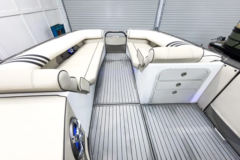 Slide: The Image of Luxurious interior of 2020 Crest Continental 270 NX-L Twin pontoon boat with plush seating. - 42
