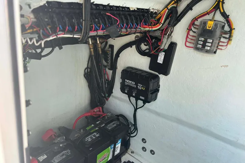Slide: The Image of Electrical wiring and battery setup in a 2014 Andros Tarpon 26 boat. - 16