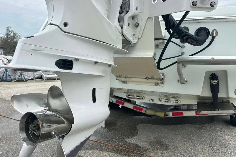 Slide: The Image of 2014 Andros Tarpon 26 boat with visible outboard motor and propeller. - 20