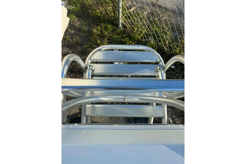 Slide: The Image of Stainless steel ladder on 2014 Andros Tarpon 26 boat, viewed from above. - 17