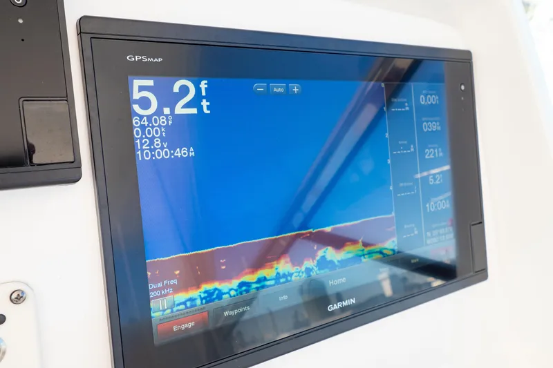 Slide: The Image of Garmin GPS display on 2018 Intrepid 475 Sport Yacht showing depth and temperature. - 101