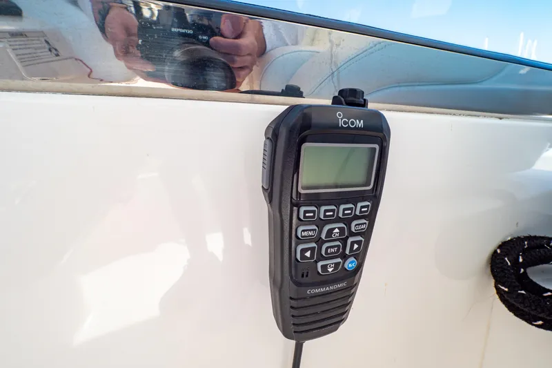 Slide: The Image of ICOM CommandMic on 2018 Intrepid 475 Sport Yacht, mounted on white panel. - 103