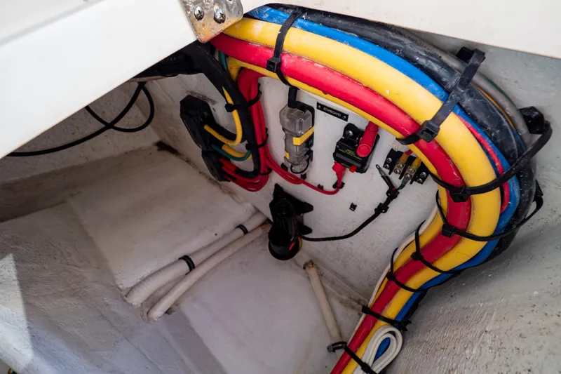 Slide: The Image of Colorful wiring in the engine compartment of a 2018 Intrepid 475 Sport Yacht. - 62