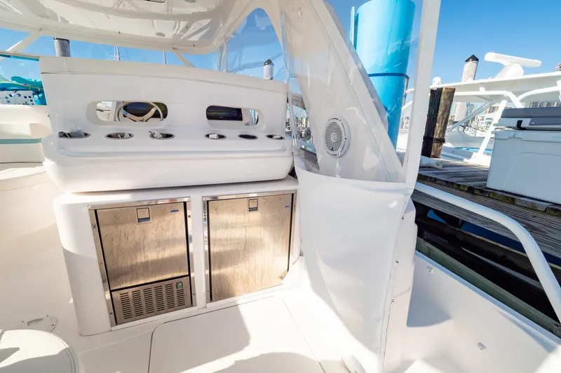 Slide: The Image of 2018 Intrepid 475 Sport Yacht interior with stainless steel appliances and sleek design. - 65
