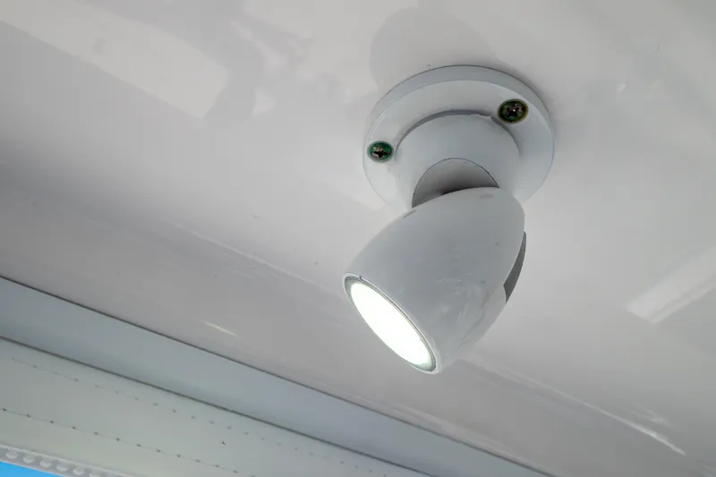 Slide: The Image of Ceiling light fixture on 2018 Intrepid 475 Sport Yacht interior. - 74