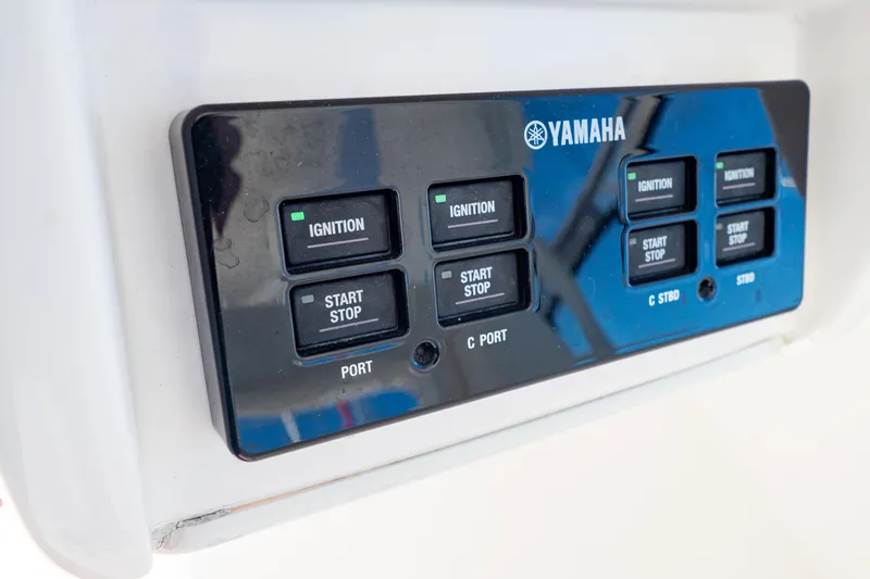 Slide: The Image of Control panel of a 2018 Intrepid 475 Sport Yacht with Yamaha ignition switches. - 99