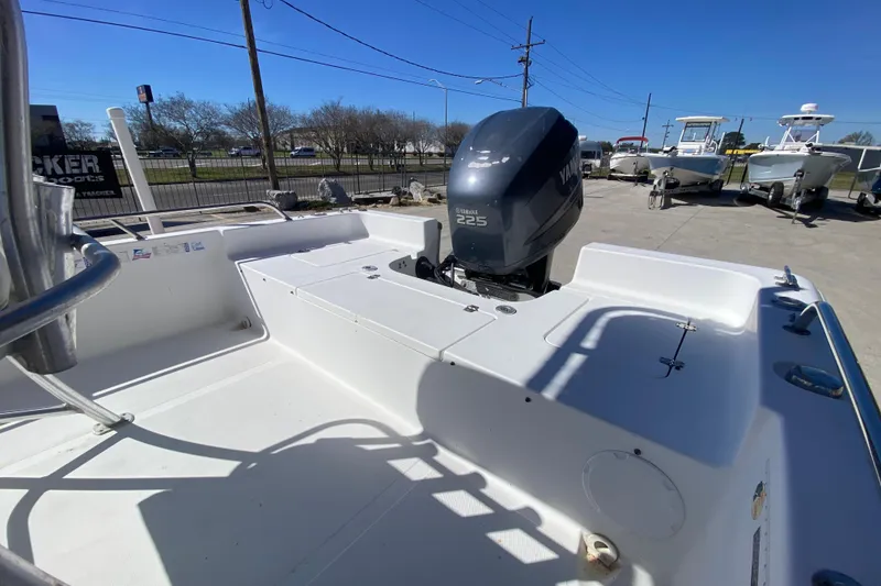 Slide: The Image of 2005 Sea Pro SV2400CC Bay Boat with Yamaha 225 engine, parked outdoors. - 11