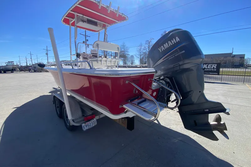 Slide: The Image of 2005 Sea Pro SV2400CC Bay Boat with Yamaha engine on trailer, sunny day. - 5