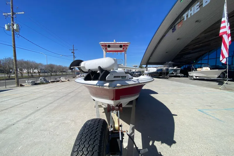 Slide: The Image of 2005 Sea Pro SV2400CC Bay Boat on trailer outside a showroom. - 8