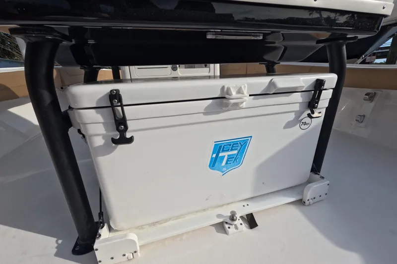 Slide: The Image of Cooler on 2024 Caymas 281 HB boat deck, featuring Icey-Tek branding. - 15