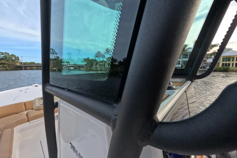 Slide: The Image of 2024 Caymas 281 HB boat on water, featuring sleek design and modern amenities. - 21