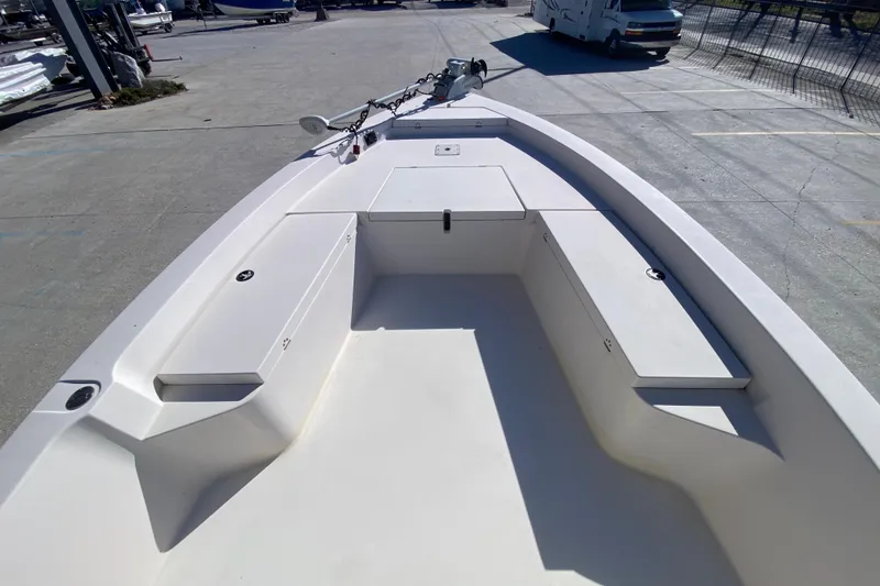 Slide: The Image of 2001 Pathfinder 2400 V boat interior with storage compartments and anchor chain. - 19