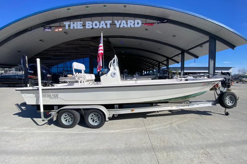 Slide: The Image of 2001 Pathfinder 2400 V boat on trailer at The Boat Yard dealership. - 2