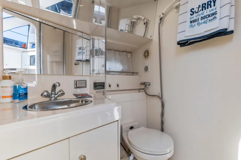 Slide: The Image of Bathroom of 2000 Carver 326 Aft Cabin Motor Yacht with sink and toilet. - 11