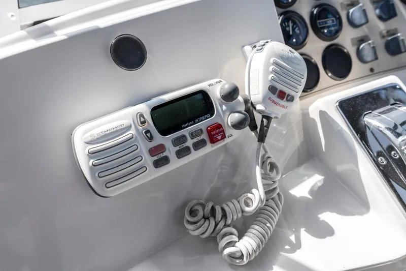 Slide: The Image of Control panel of a 2000 Carver 326 Aft Cabin Motor Yacht with radio equipment. - 28