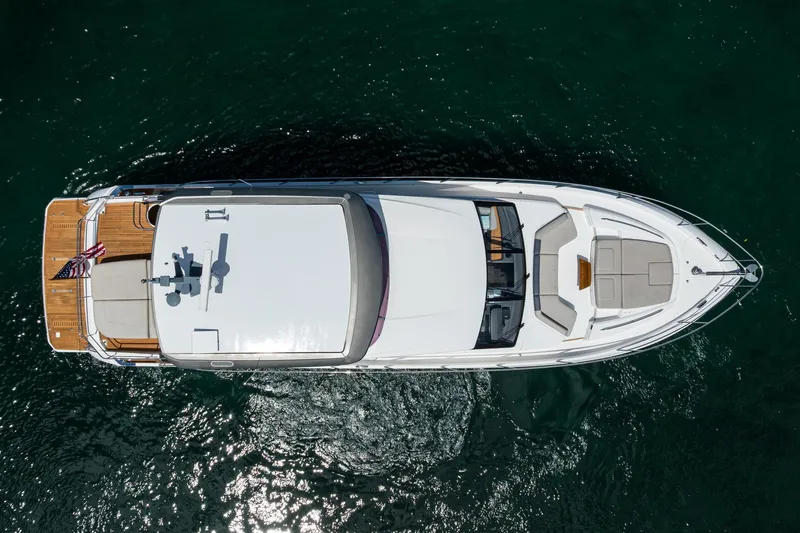Slide: The Image of Top view of a 2020 Princess F70 yacht on clear water. - 17