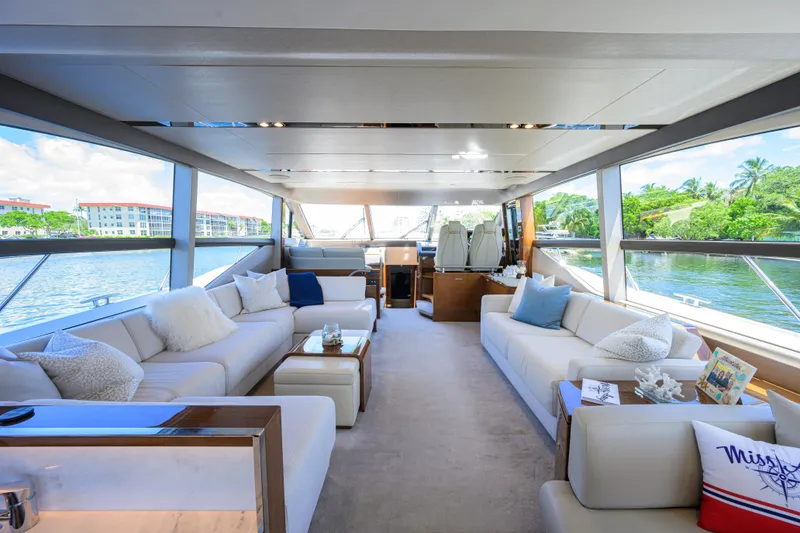 Slide: The Image of Luxurious interior of 2020 Princess F70 yacht with elegant seating and panoramic windows. - 19
