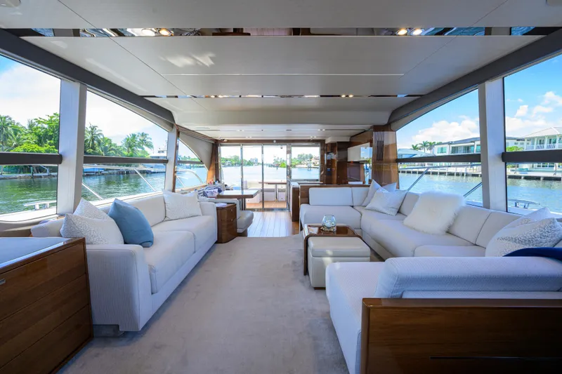 Slide: The Image of Luxurious interior of 2020 Princess F70 yacht with elegant seating and panoramic windows. - 20