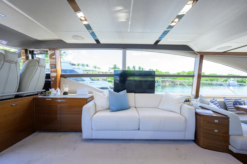 Slide: The Image of Luxurious interior of 2020 Princess F70 yacht with elegant seating and scenic window view. - 21