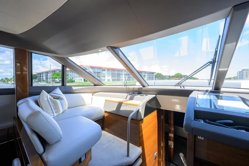 Slide: The Image of Luxurious interior of 2020 Princess F70 yacht with modern seating and panoramic windows. - 23