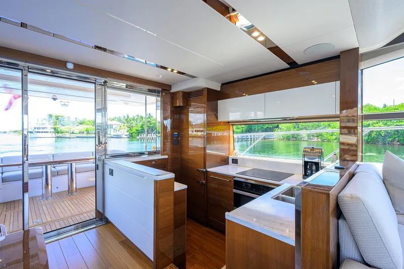 Slide: The Image of Luxurious interior of 2020 Princess F70 yacht with modern kitchen and scenic water view. - 27