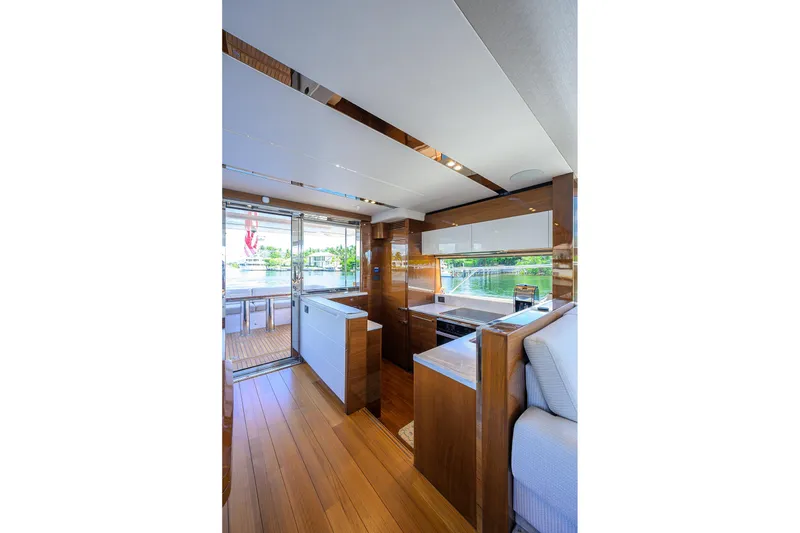 Slide: The Image of Luxurious interior of 2020 Princess F70 yacht with modern kitchen and wooden flooring. - 28