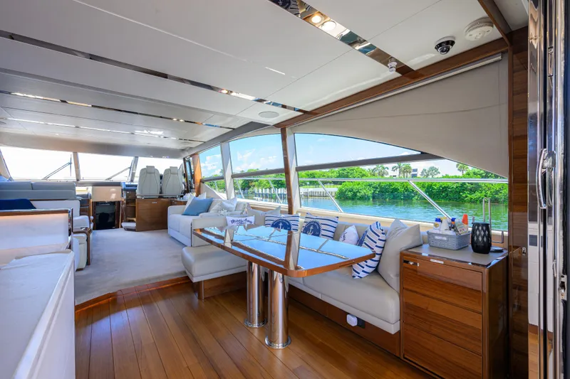 Slide: The Image of Luxurious interior of 2020 Princess F70 yacht with elegant seating and scenic window views. - 33