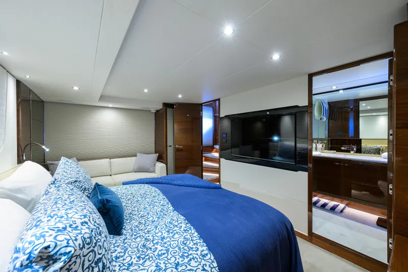 Slide: The Image of Luxurious 2020 Princess F70 yacht bedroom with elegant decor and modern amenities. - 36