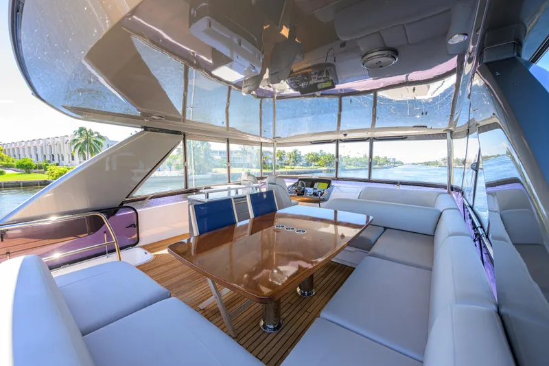 Slide: The Image of Luxurious 2020 Princess F70 yacht interior with elegant seating and panoramic views. - 49