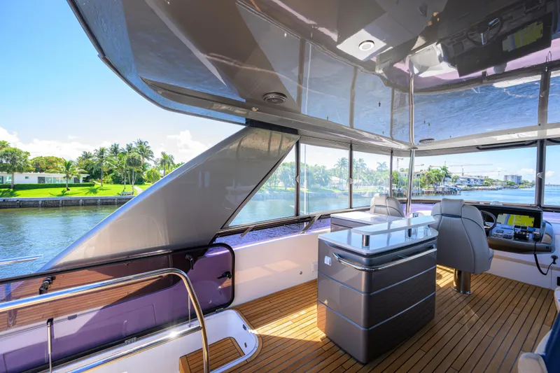 Slide: The Image of Luxurious 2020 Princess F70 yacht interior with sleek design and waterfront view. - 57