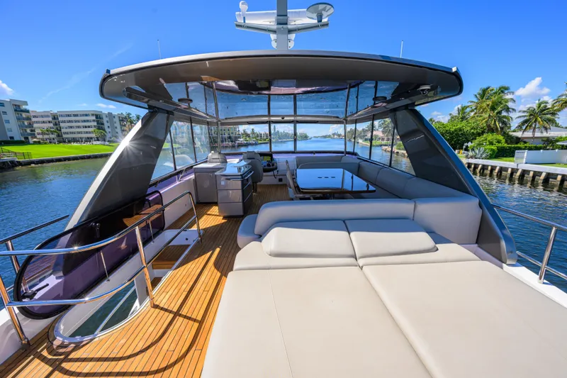 Slide: The Image of Luxurious 2020 Princess F70 yacht with spacious deck and modern amenities, cruising on a sunny day. - 59