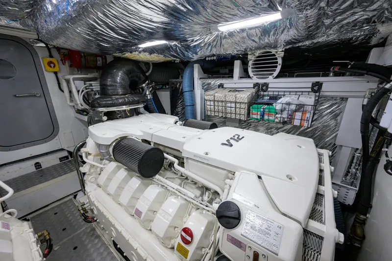 Slide: The Image of Engine room of 2020 Princess F70 yacht with V12 engine and metallic insulation. - 74