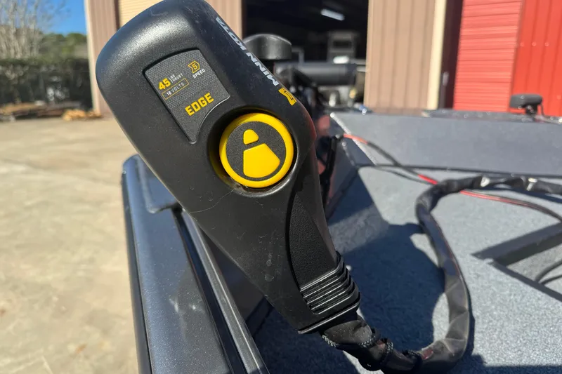 Slide: The Image of Close-up of a 2018 Alumacraft Crappie Deluxe boat control handle. - 11