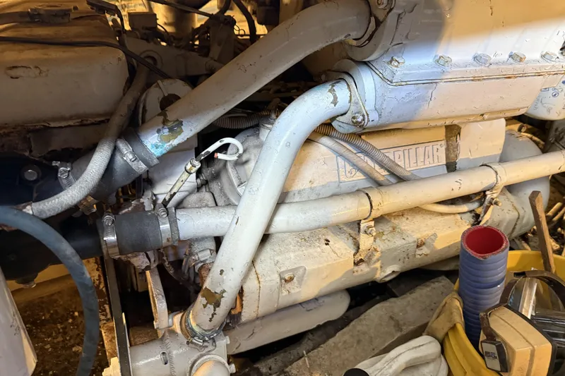 Slide: The Image of Engine compartment of a 1970 Tiffany 46 ft Sportfish boat. - 25