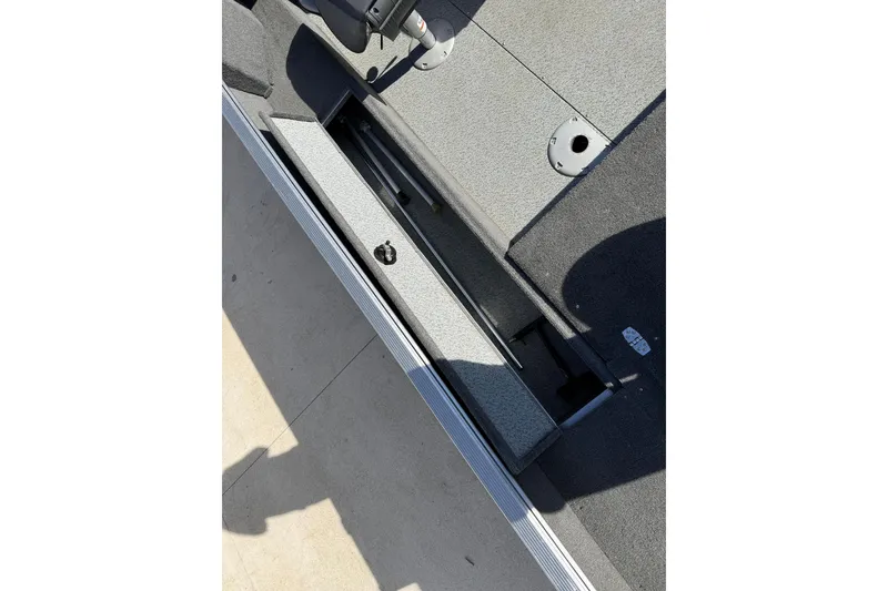 Slide: The Image of 2014 Lund 1875 Impact SS boat interior storage compartment. - 25