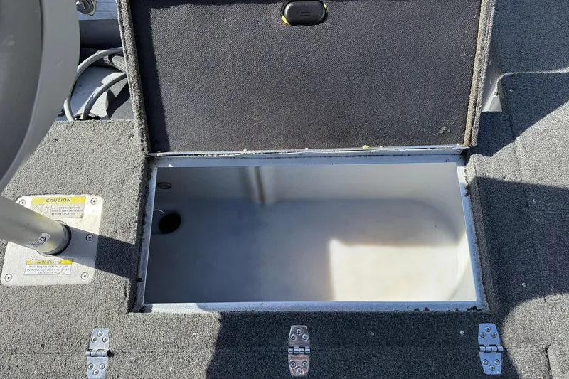 Slide: The Image of Open storage compartment on 2014 Lund 1875 Impact SS boat deck. - 26