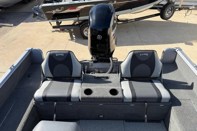 Slide: The Image of 2014 Lund 1875 Impact SS boat with two seats and motor. - 28