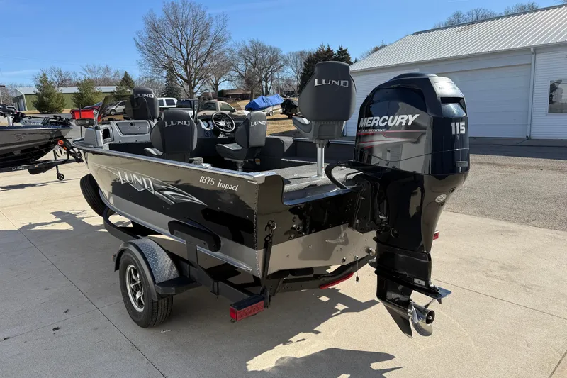 Slide: The Image of 2014 Lund 1875 Impact SS boat with Mercury 115 outboard motor on trailer. - 5